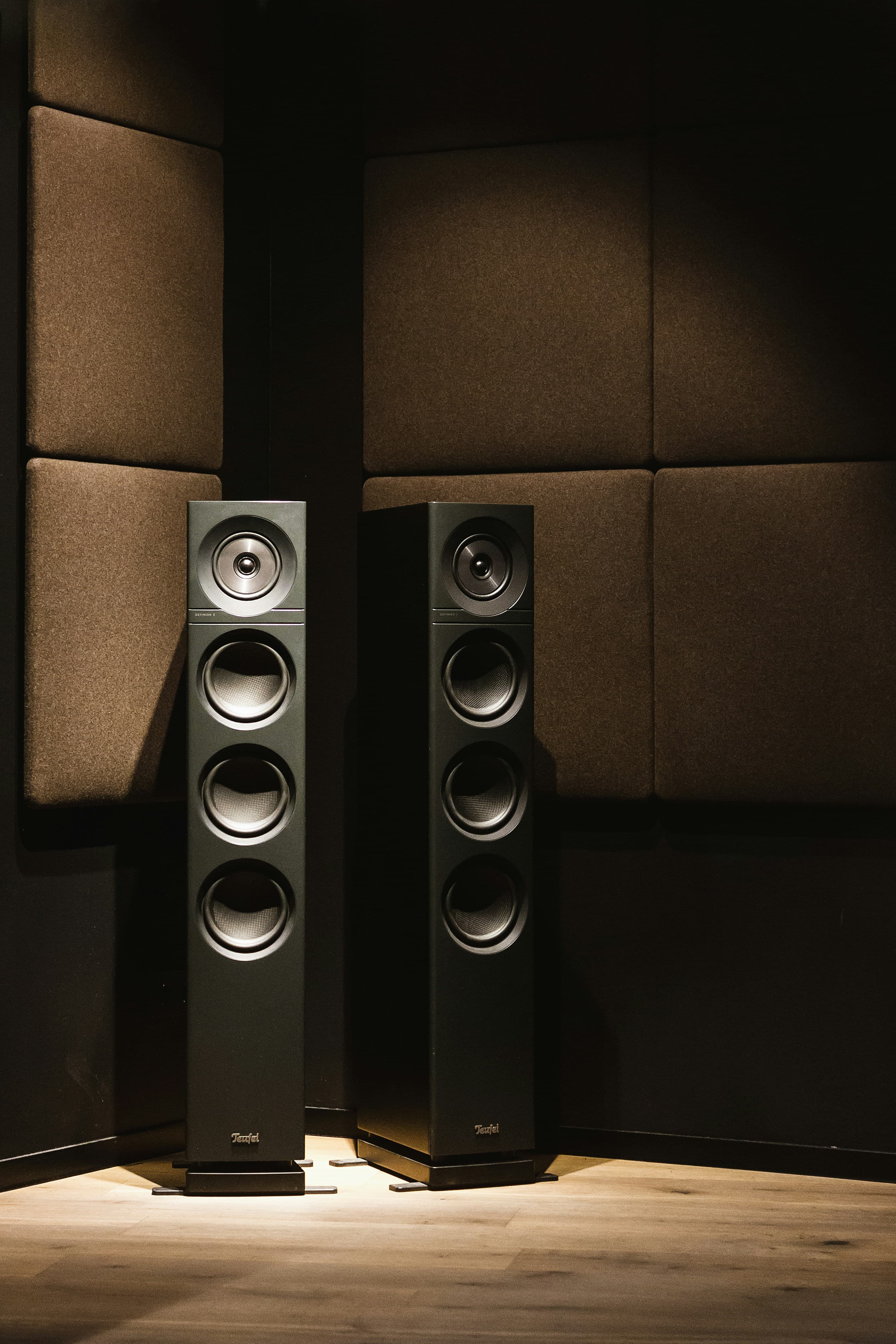 Tower speakers in an acoustically treated listening room